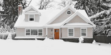 a house covered in snow